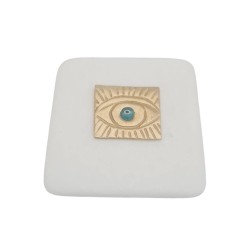 Devil eye brass on marble 7x7cm.