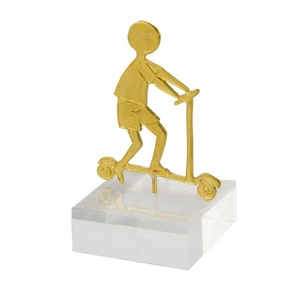 Brass boy on scooter , acrylic base 9x5.5x5cm