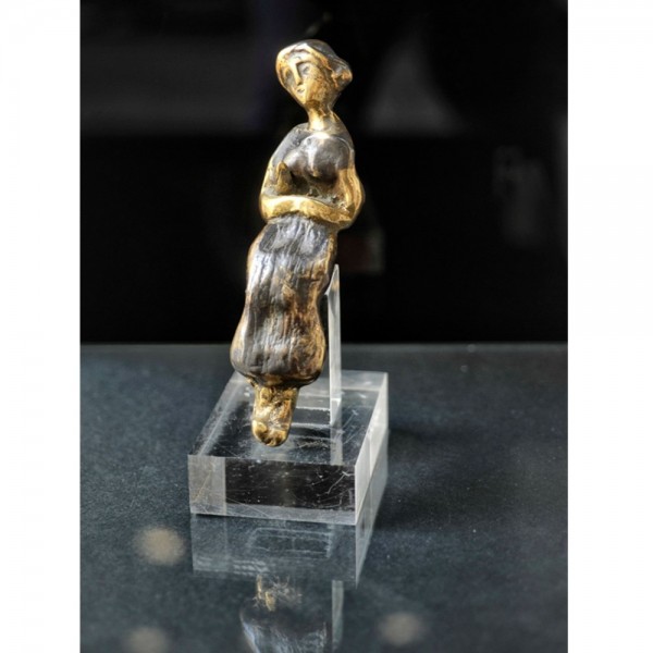 Bronze sculpture woman with bird on acrylic base 21x11x8cm.