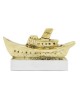 Solid brass ship on an aluminum base, 7x13x3cm.